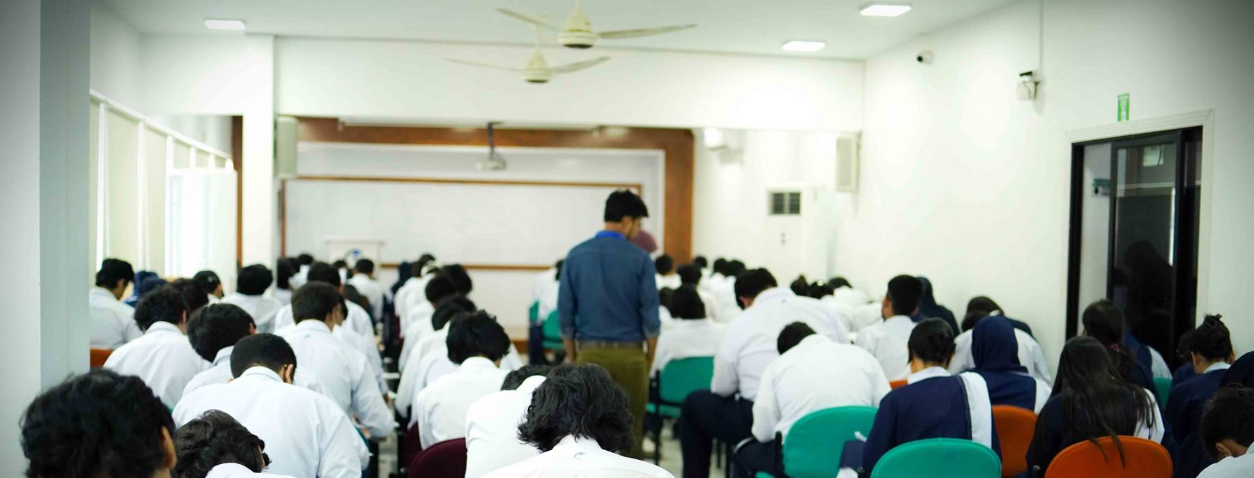 Whales College students during an examination